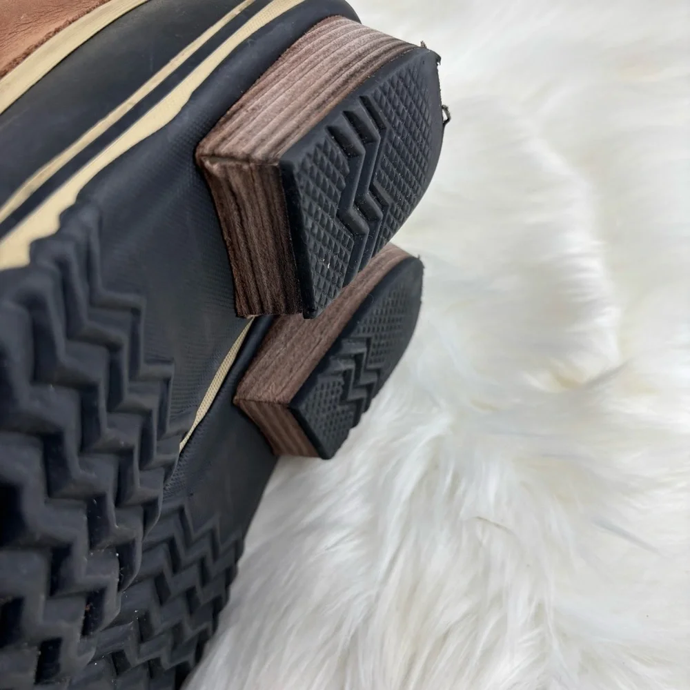 Sorel Tan and Black Lace-Up Boots